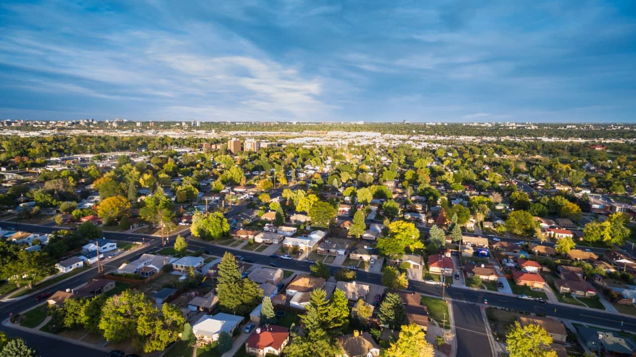 Aerial view of a residential neighborhood at sunrise