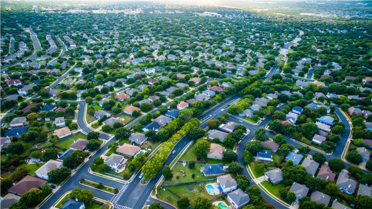 Aerial view of a tree-lined residential neighborhood