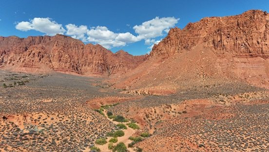 Aerial view of a red rock valley near Ivins, Utah