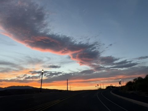 Sunset sky over a quiet road in Ivins, Utah